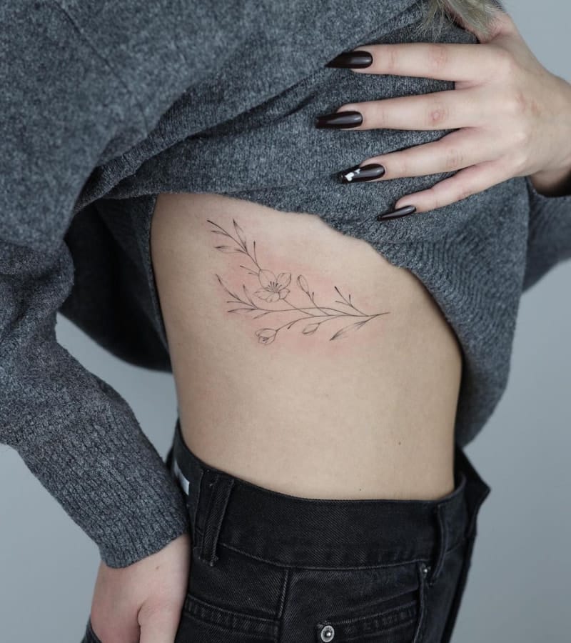 Flowers on the rib cage Painful  Inspired Ink Tattoos  Facebook