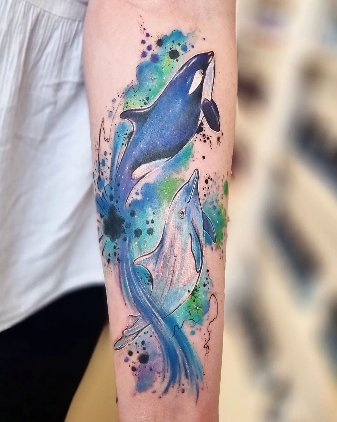 Dive into 20+ Breathtaking Dolphin Tattoo Designs - WomenSew