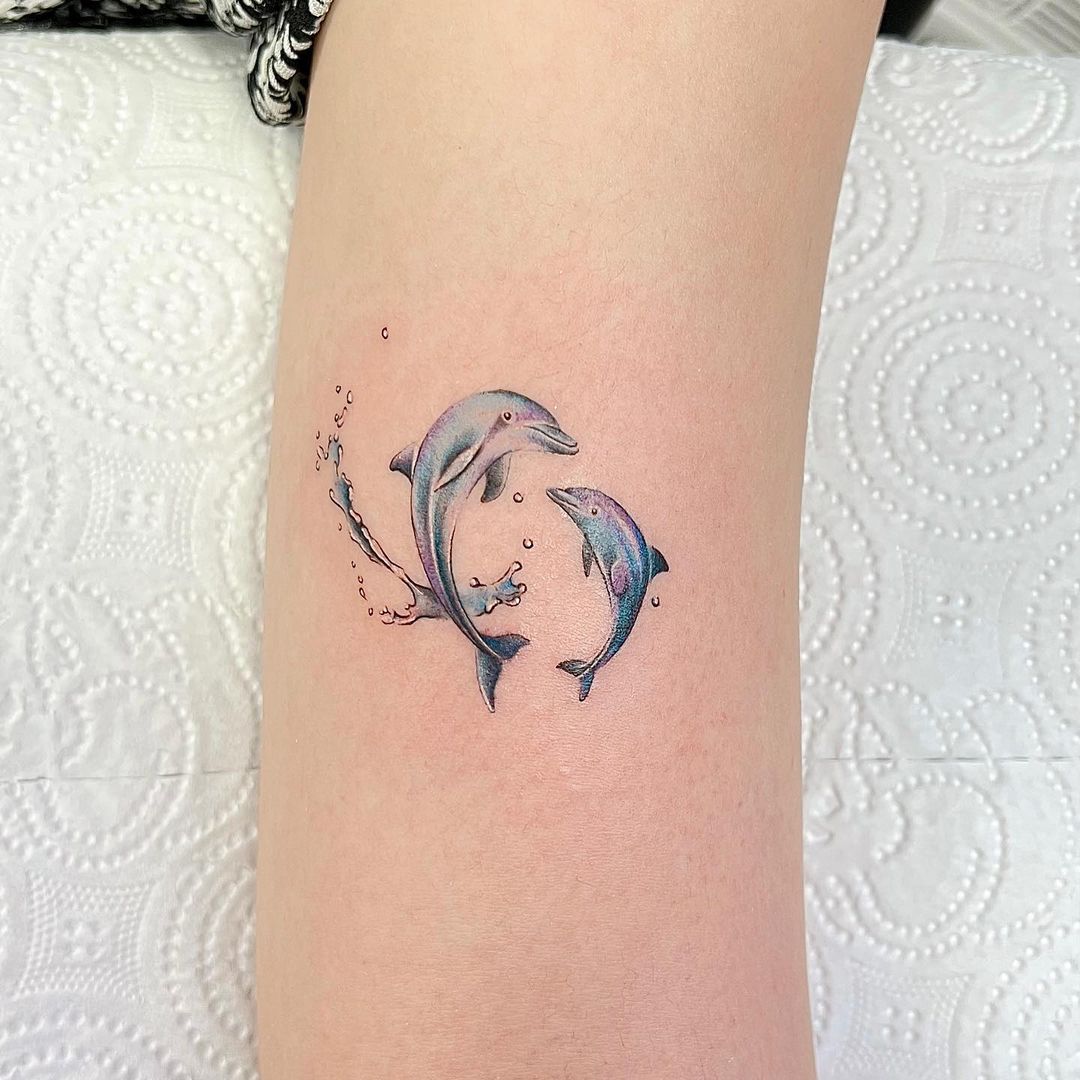 Dive into 20+ Breathtaking Dolphin Tattoo Designs - WomenSew