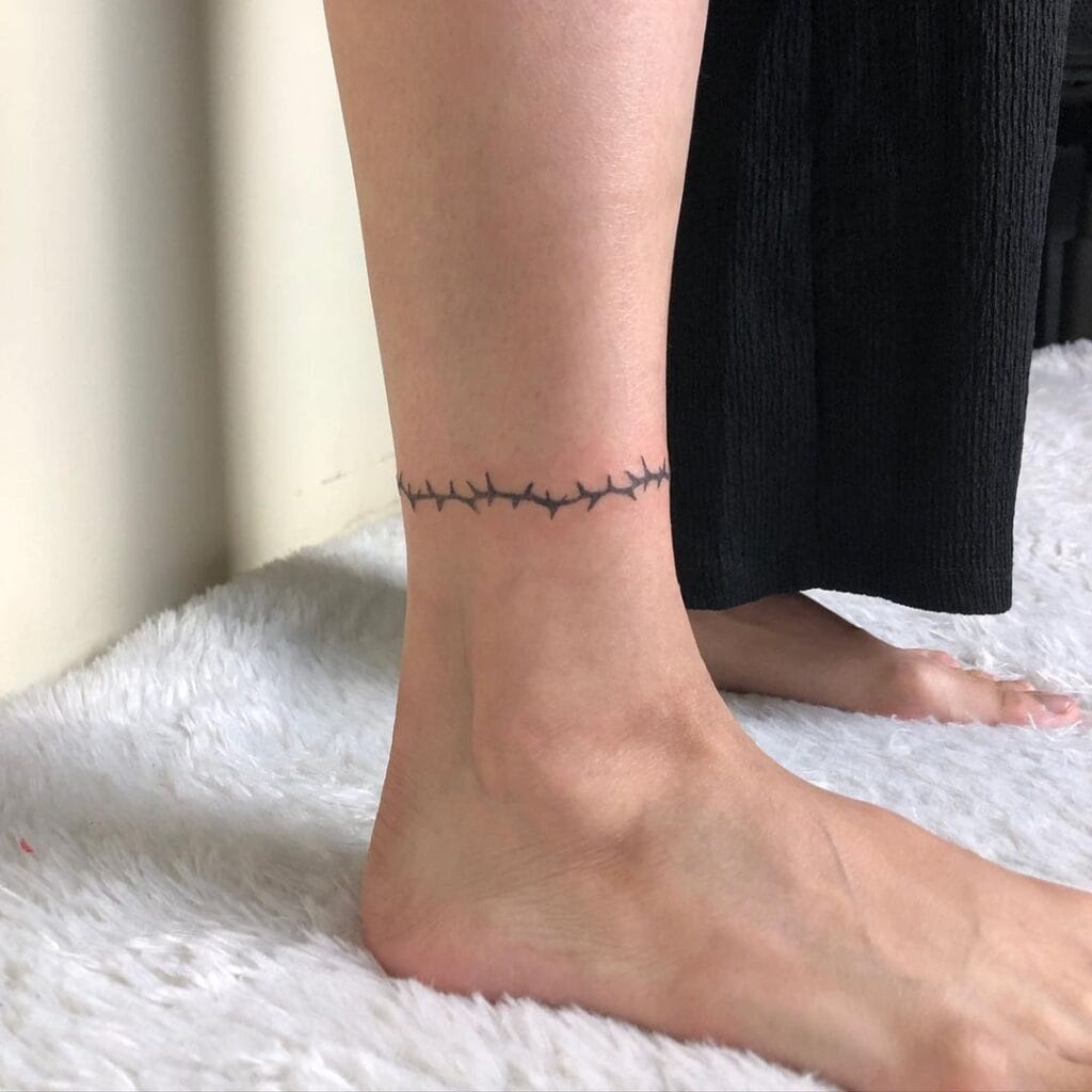 Ankle Wraparound Tattoo