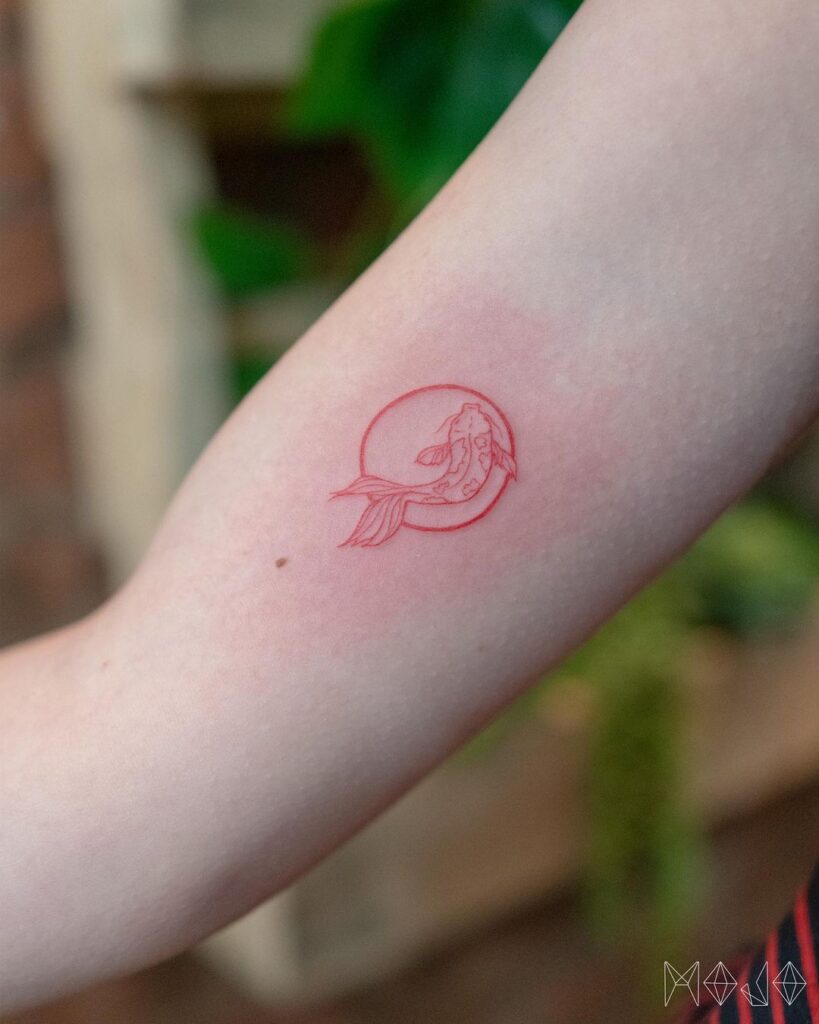 Upper Arm Small Tattoo