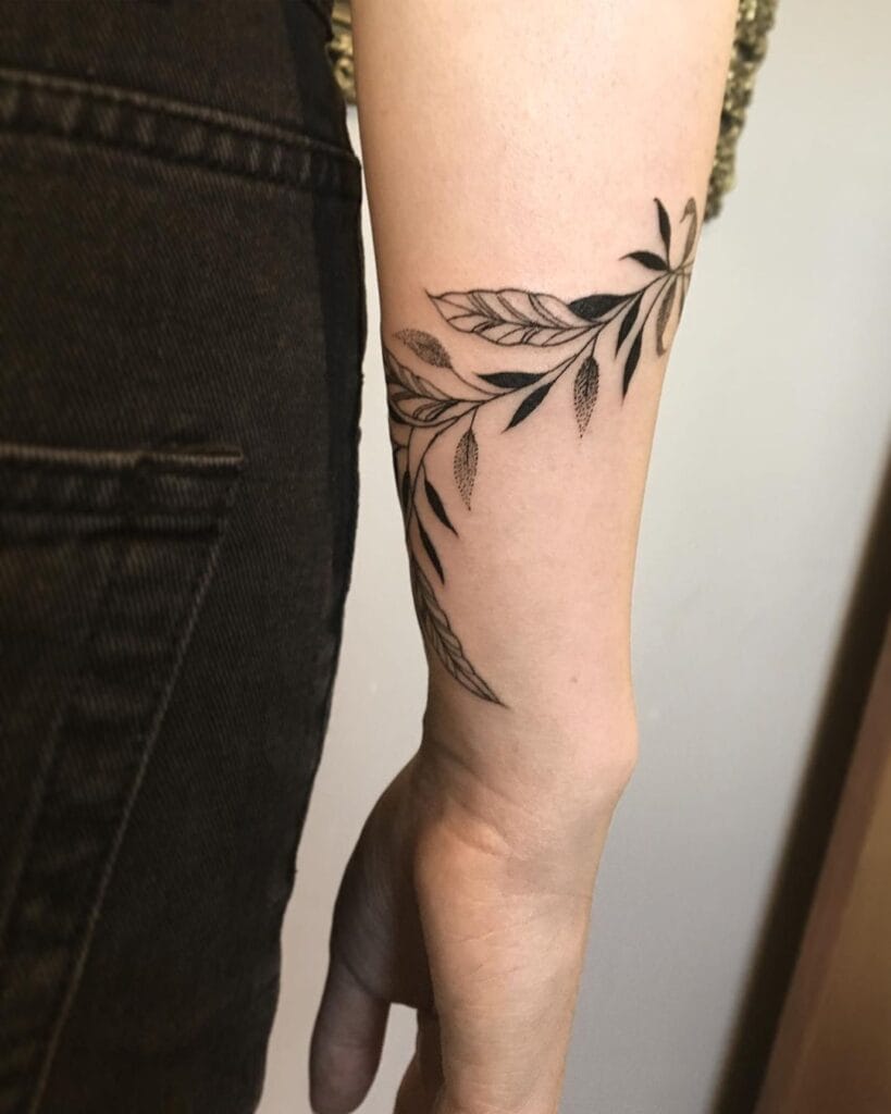 Wraparound Arm Tattoo