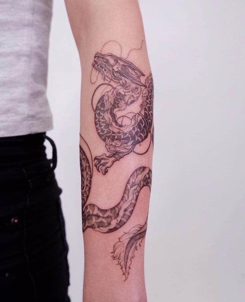 Wraparound Arm Tattoo