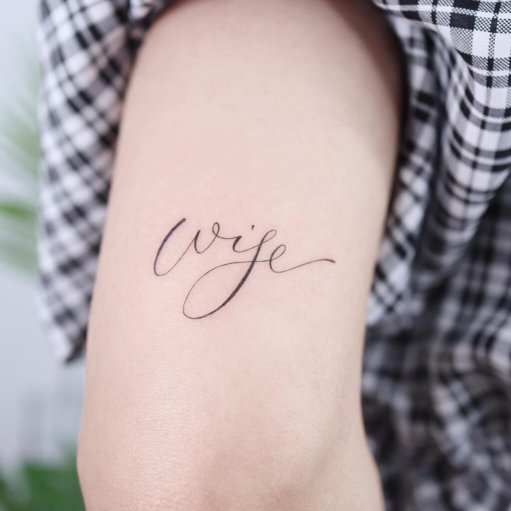 Upper Arm Small Tattoo