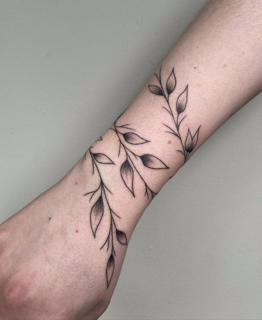 Wraparound Arm Tattoo